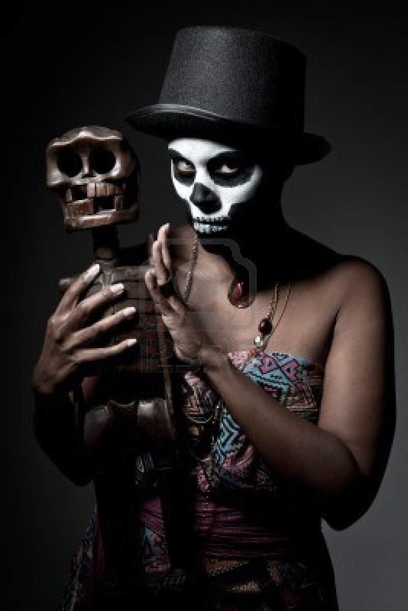 http://us.123rf.com/400wm/400/400/moori/moori1111/moori111100125/11218670-a-female-voodoo-priestess-with-face-paint.jpg